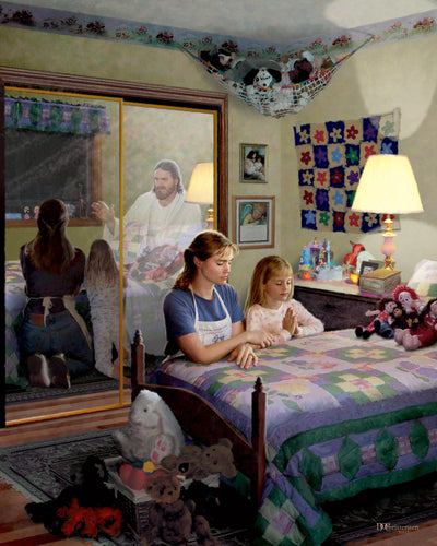 Mother and daughter kneeling to pray at a bed with Jesus's reflection in the mirror.